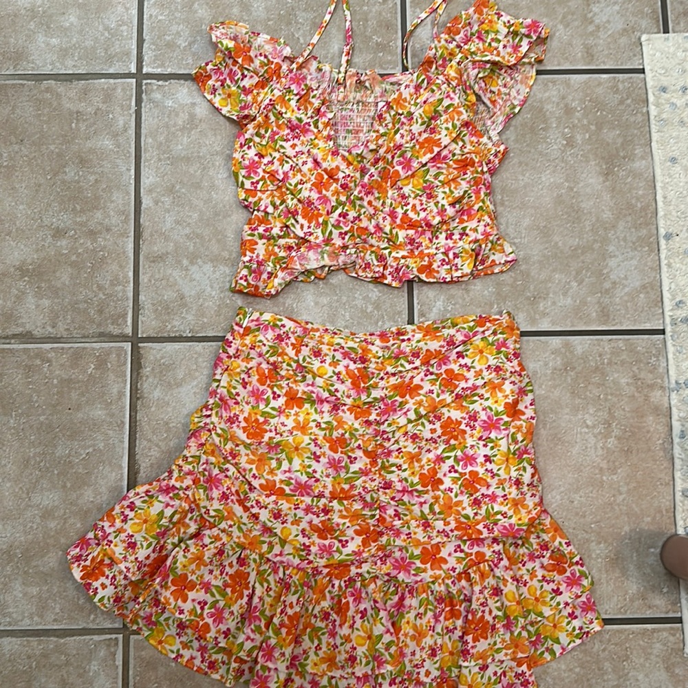 DO + BE Fun Floral Set with high rise mini skirt off the shoulder stretchy top
